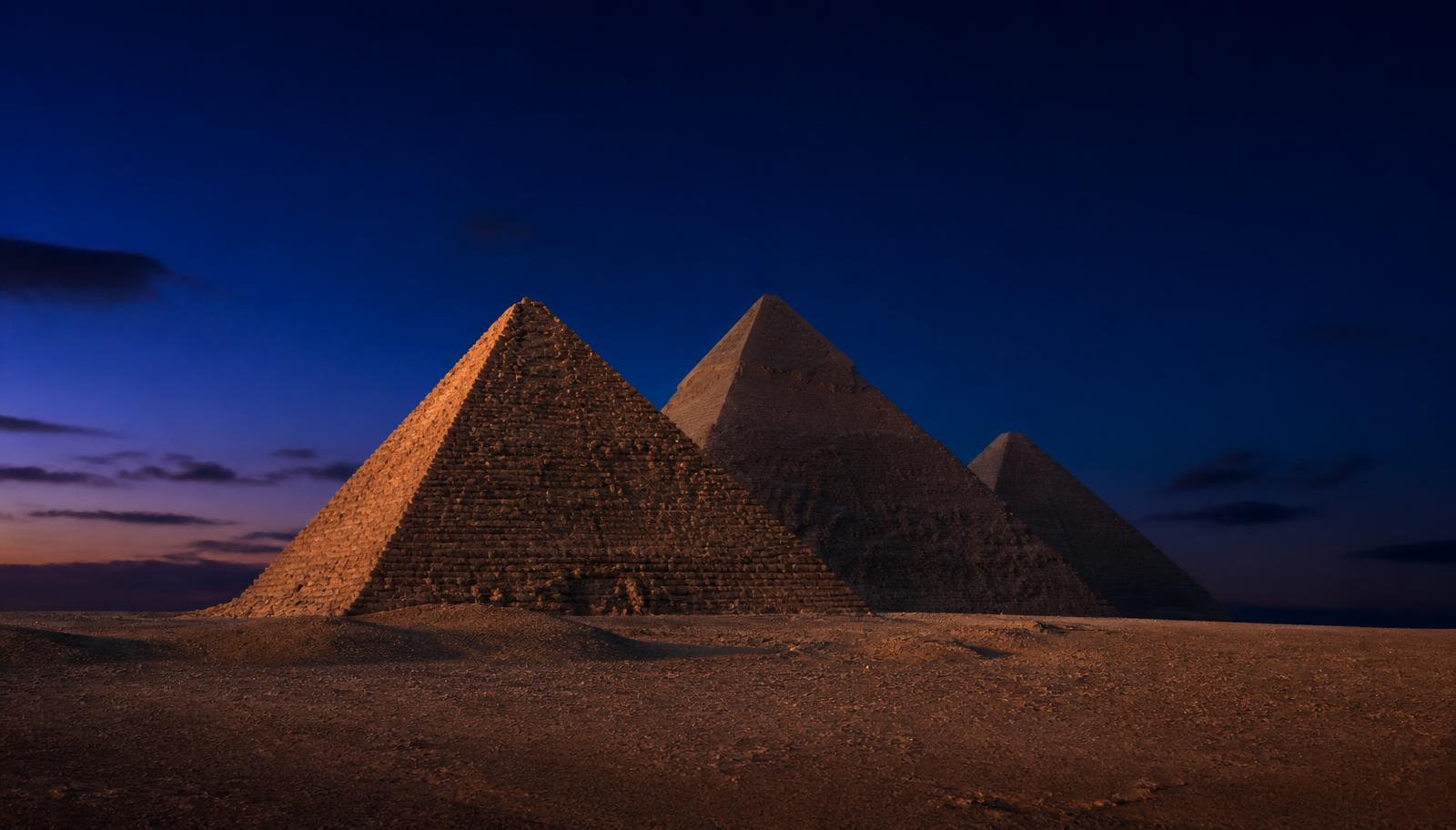 The pyramids of Giza at dusk
